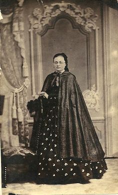 Civil War full length cloak with fitted shoulders and single closure at neck.