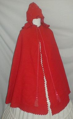 Civil War long cloak with fitted shoulders and hood.