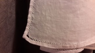 plaited-apron-drawn-thread-hem