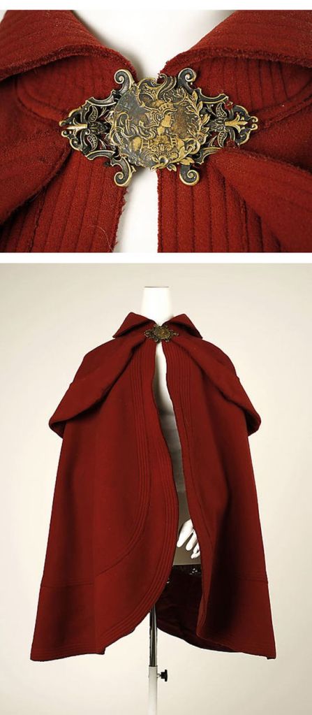1890 red wool cape with metal clasp