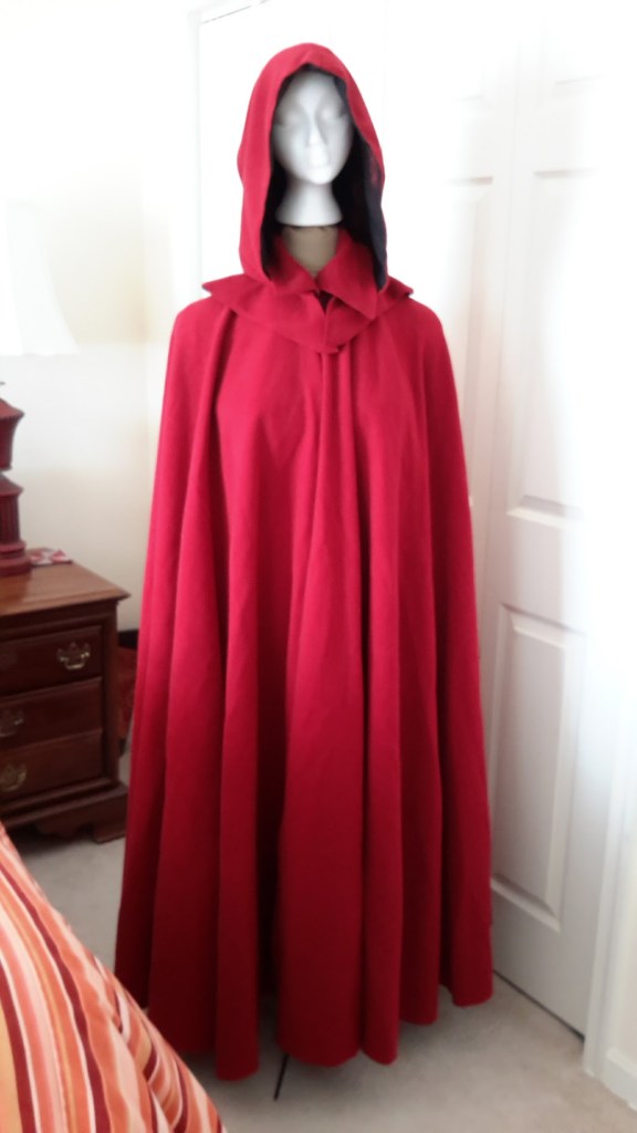 red-cloak-tall-head-front