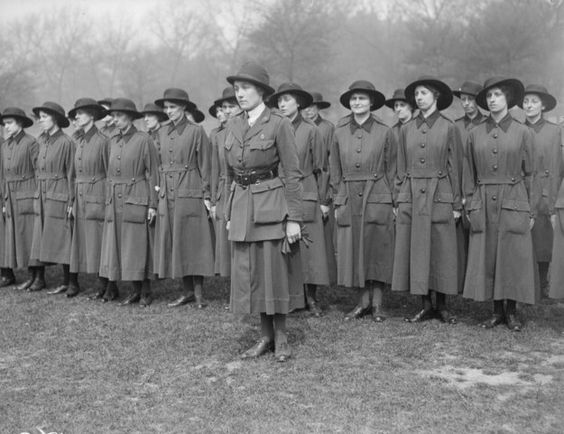 WWI Uniform dress- notice officer has jacket but the rest are shirtwaist dresses.- these are probably wool serge.